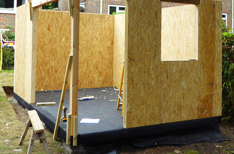 Construction of a home office showing insulated panels