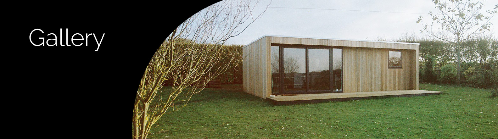 A large timber and glass garden room in West London