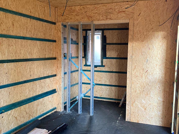 pocket doors and wiring being installed